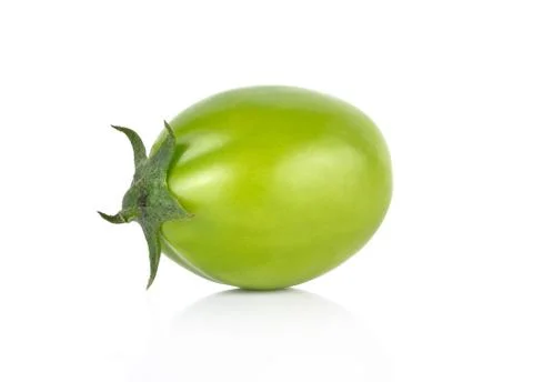 Green tomato on white background Stock Photos