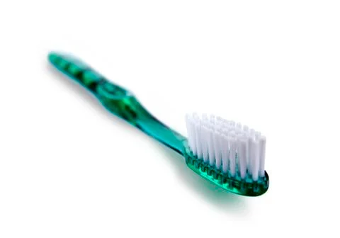 Green toothbrush Stock Photos