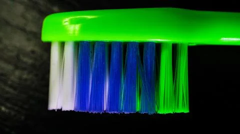 Green toothbrush surface Stock Photos