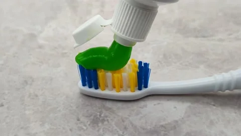Green toothpaste and toothbrush Stock Footage 167268108