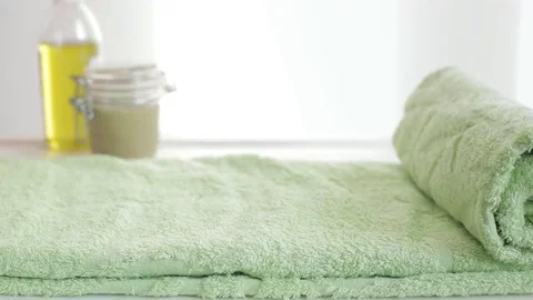 Green towel rolling Video stock 69242877