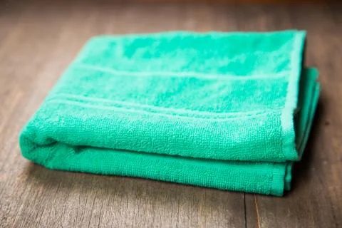 Green towel in studio Stock Photos