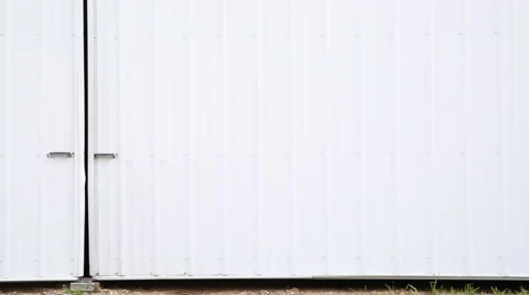 Green Tractor Exits Barn Stockbeeldmateriaal 45695739