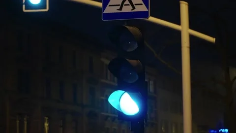Green traffic light at night Stock Footage 197171649