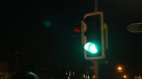 Green traffic light at night Stock Footage 267061326