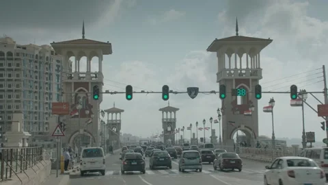 Green traffic light on Stanley Bridge in Alexandria Egypt Stock Footage 175595922