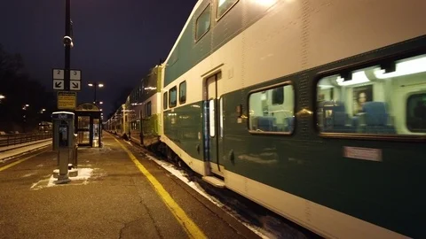 Green train leaving station Stock Footage 102807540