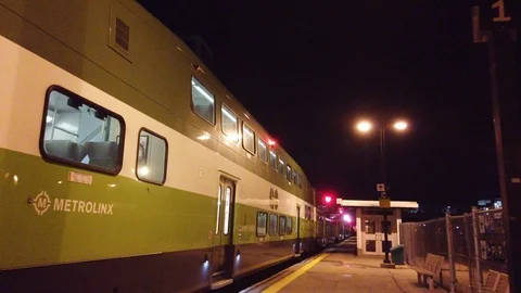 Green Train at station at Night Stock Footage 102801281