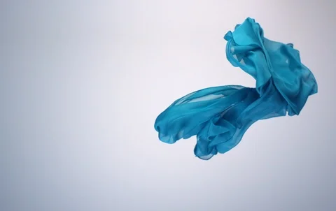 Green transparent fabric flowing by wind, slow motion Stock Footage 96352146