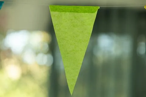 Green triangular bunting at a childrens birthday party Stock Photos