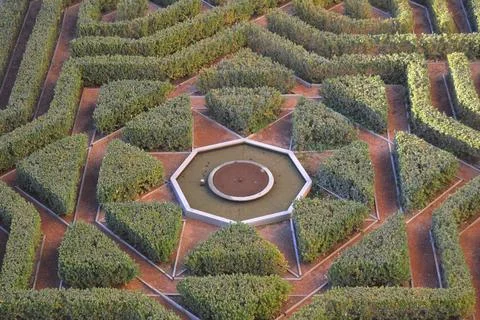 Green triangular garden Stock Photos