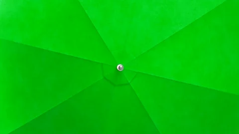 Green umbrella looping spin 3D animation Stock Footage 152022046