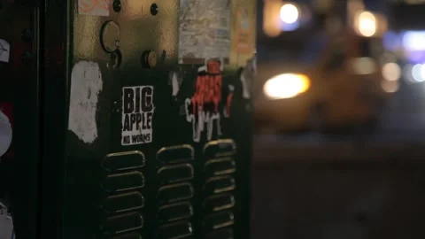 Green Utility Box with Stickers on Night Street Stock Footage 341019173
