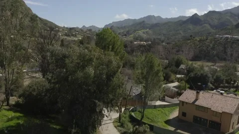 Up in a green valley between hills Stock-Footage 133846242