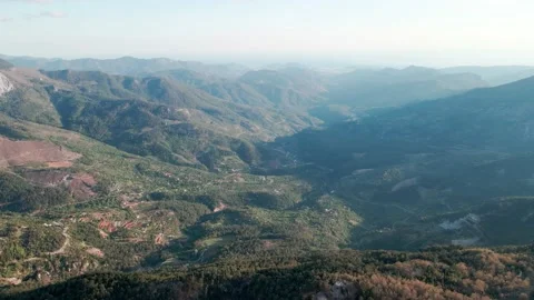 Green valley in the mountains, flying a 4k drone Stock Footage 213624414