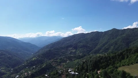 Green valley surrounded by forested mountains, Adjara, Georgia Stock Footage 337341695