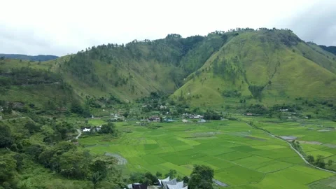 Green valleys and mountains in rural Sumatra, Indonesia Stock Footage 213922772