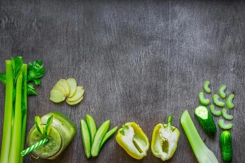 Green vegetable smoothie with celery, ginger and cucumber Stock Photos