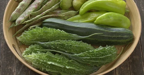 Green vegetables on a bamboo tray. Stock Footage 280105275