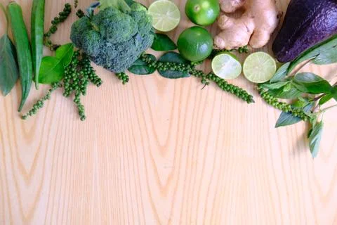 Green vegetables broccoli, ginger, lime, avocado, green pepper, Green okra Stock Photos