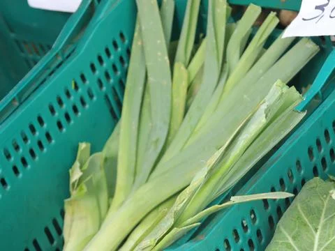 Green vegetables in a close-up macro view at a Brazilian food fair. Stock Photos