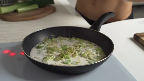 Green vegetables roasted with coconut milk in pan. Thai dish Stock Footage 99017971