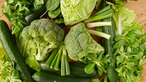 Green vegetables on the table. Stock Footage 244334675