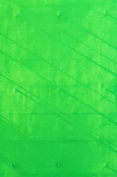 Green wall background with shadow strips Stock Photos