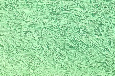 Green wall background with structure of plaster Stock Photos