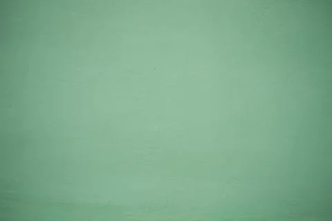 Green wall texture for background use. Pastel colors. Stock Photos
