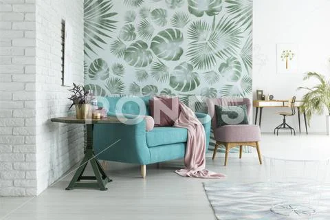 Green wallpaper in living room Stock Photos