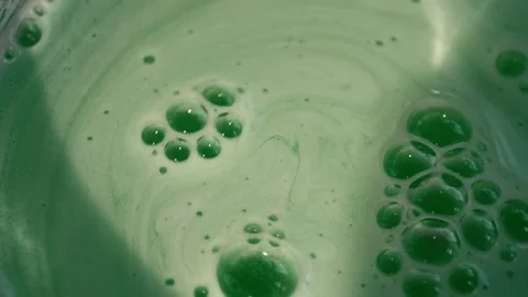Green water bubbles close up shot Stock Footage 294207786