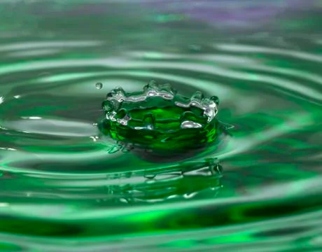 Green water drop Stock Photos