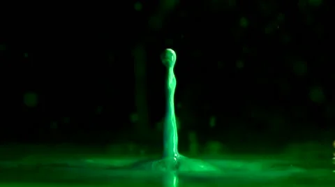 Green water drop in slow motion 2 Stock Footage 44293502