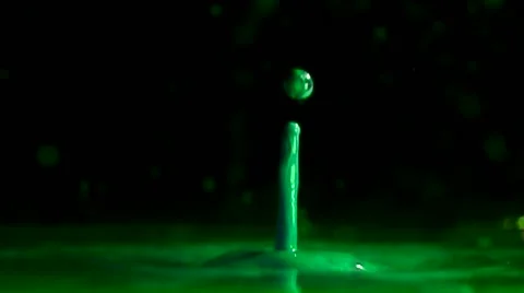 Green water drop in slow motion Stock Footage 44293759