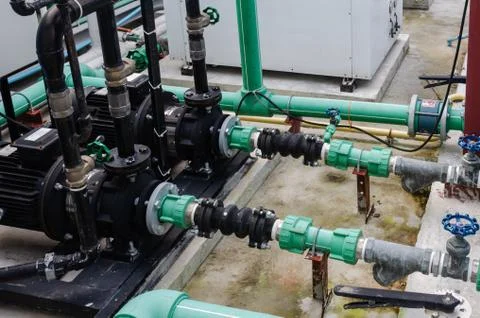 Green water pipe system Stock Photos