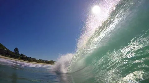 Green water surfing wave breaking at beach POV Stock Footage 59127239