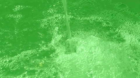 Green waterfall drops closeup, transparent water, clear environment. Stock Footage 39584161