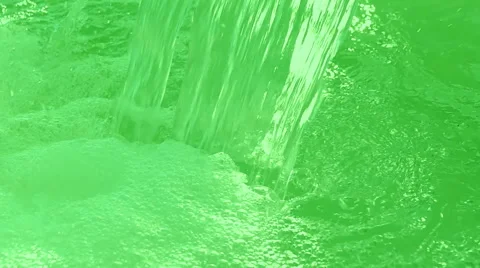 Green waterfall drops closeup, transparent water, clear environment. Stock Footage 40668954