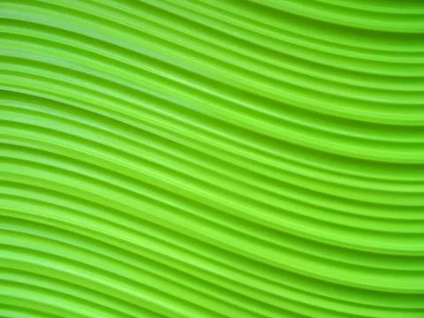 Green wavy abstract background. Stock Photos
