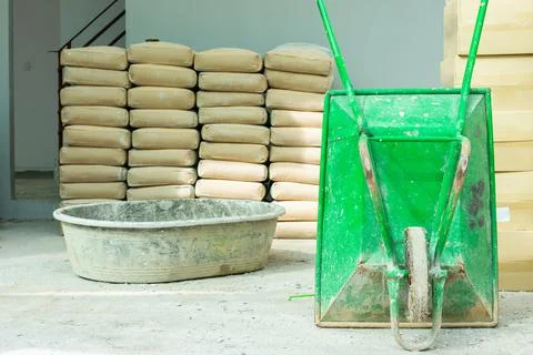 Green wheelbarrow Stock Photos