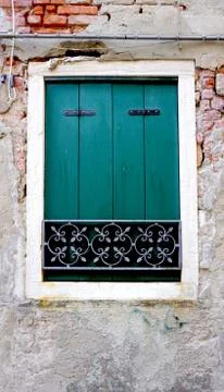 Green Window on old brick wall Stock Photos