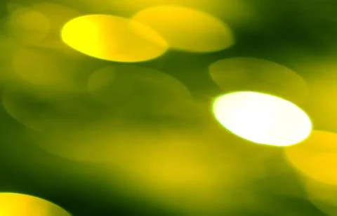 Green yellow circle shape lights as christmas background. Stock Photos