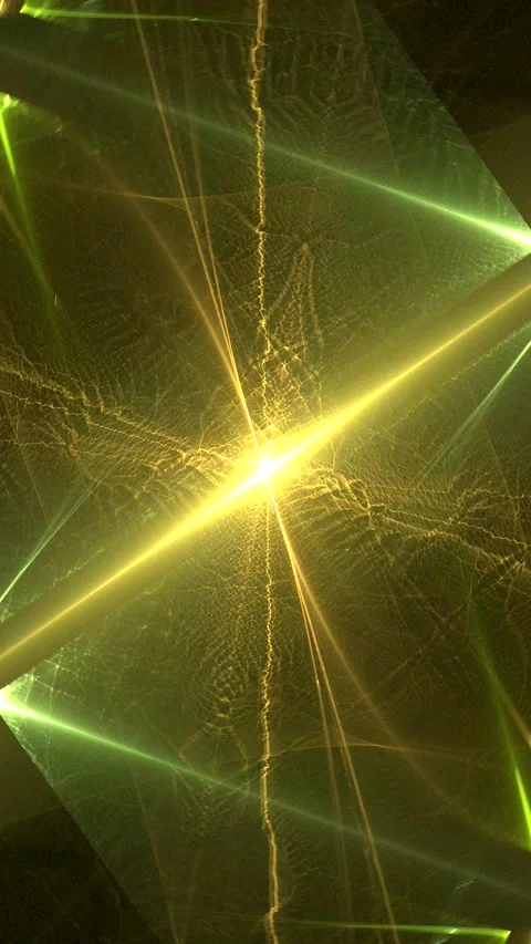 Green yellow rotating glowing pattern of curved rays on a black background Video stock 336889058