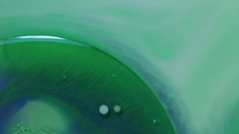 Green/Blue Bubble in Mysterious Substance Video stock 76342499