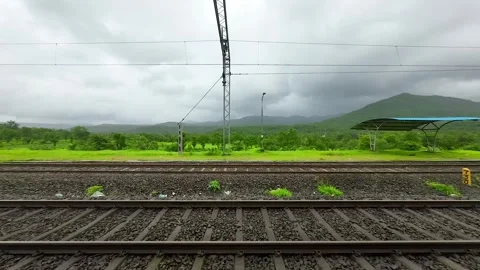 Greenery forest hyper laps in rain view from train window in Konkan railway Stock Footage 248489407
