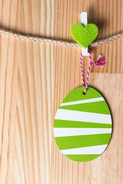 Greenery heart and easter egg on a twine. Photos