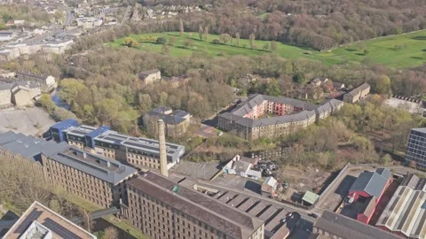 Greenhead Park and former mill chimney near University of Huddersfield Kirklees 動画素材 333542938