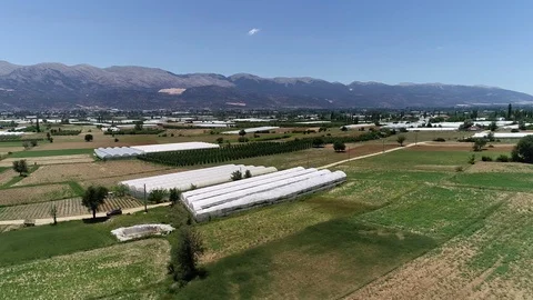 Greenhouse built on a wide plain Stock Footage 122397871