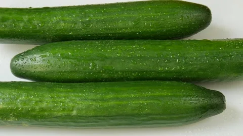 Greenhouse cucumbers on a plate. Stock Footage 328403136